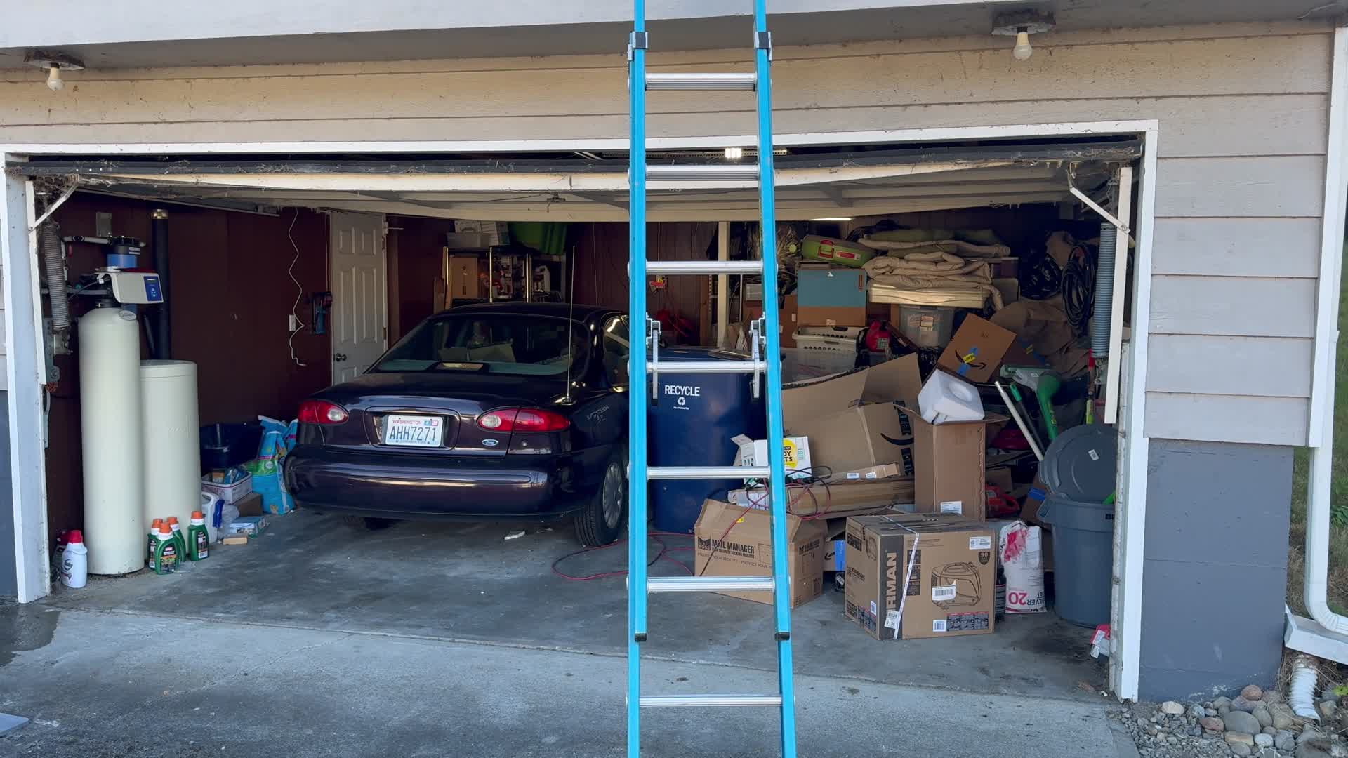 Garage area before cleanup for future CareTV rack